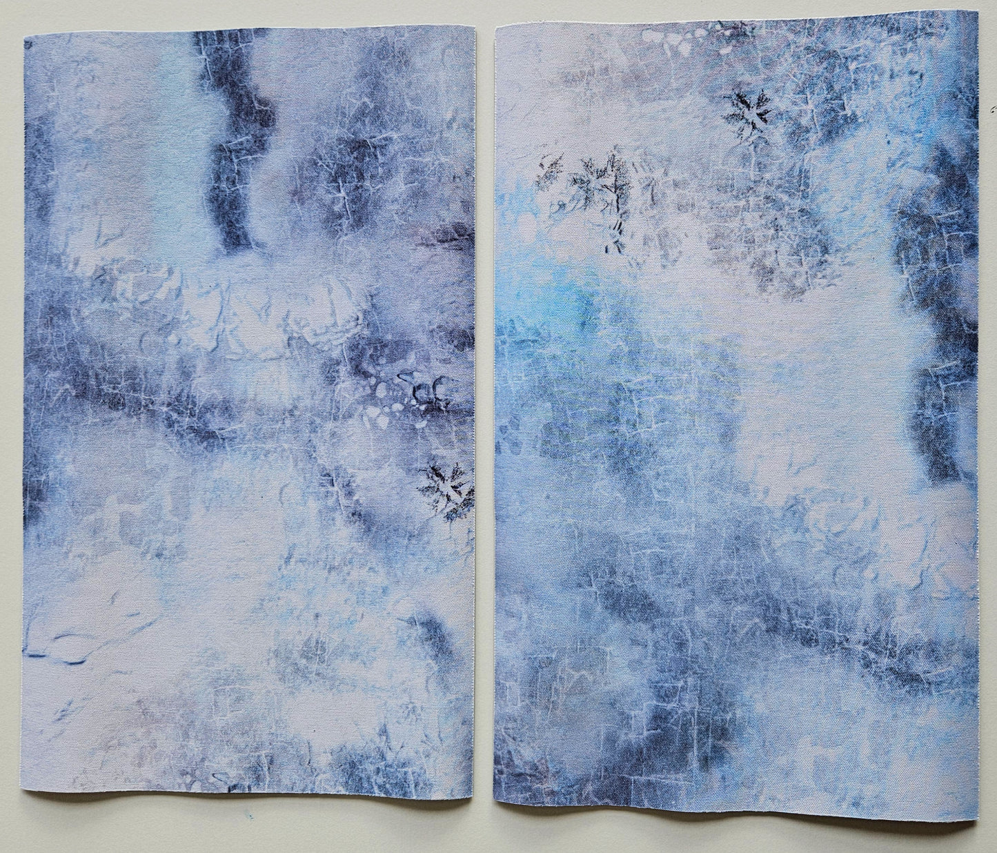 AllOutWar terrain layout templates shown in multiple mat designs including ice tundra — design received will vary