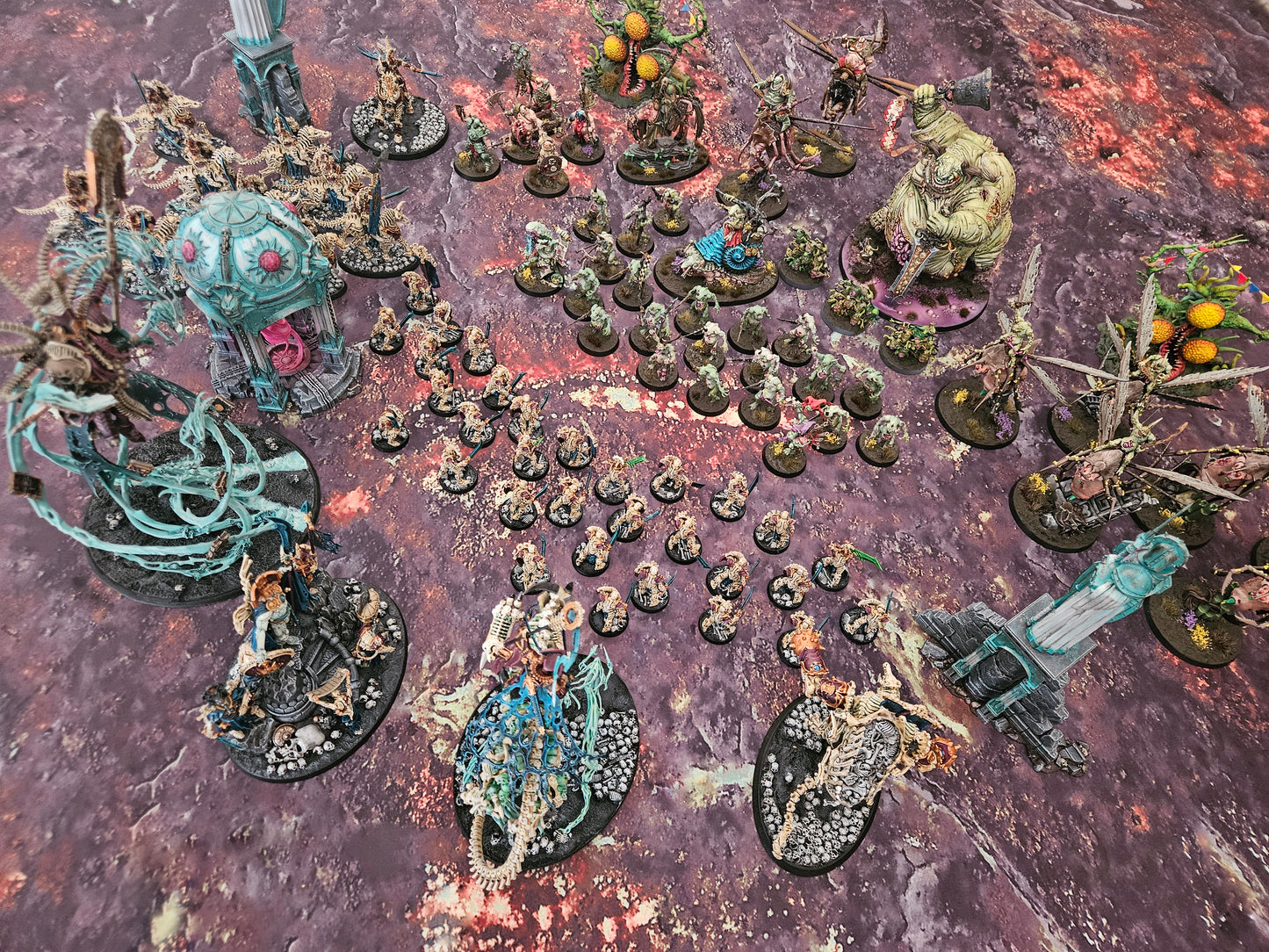 Death World wargaming mat set up as hostile alien planet battlefield with glowing energy fissures for Warhammer 40K