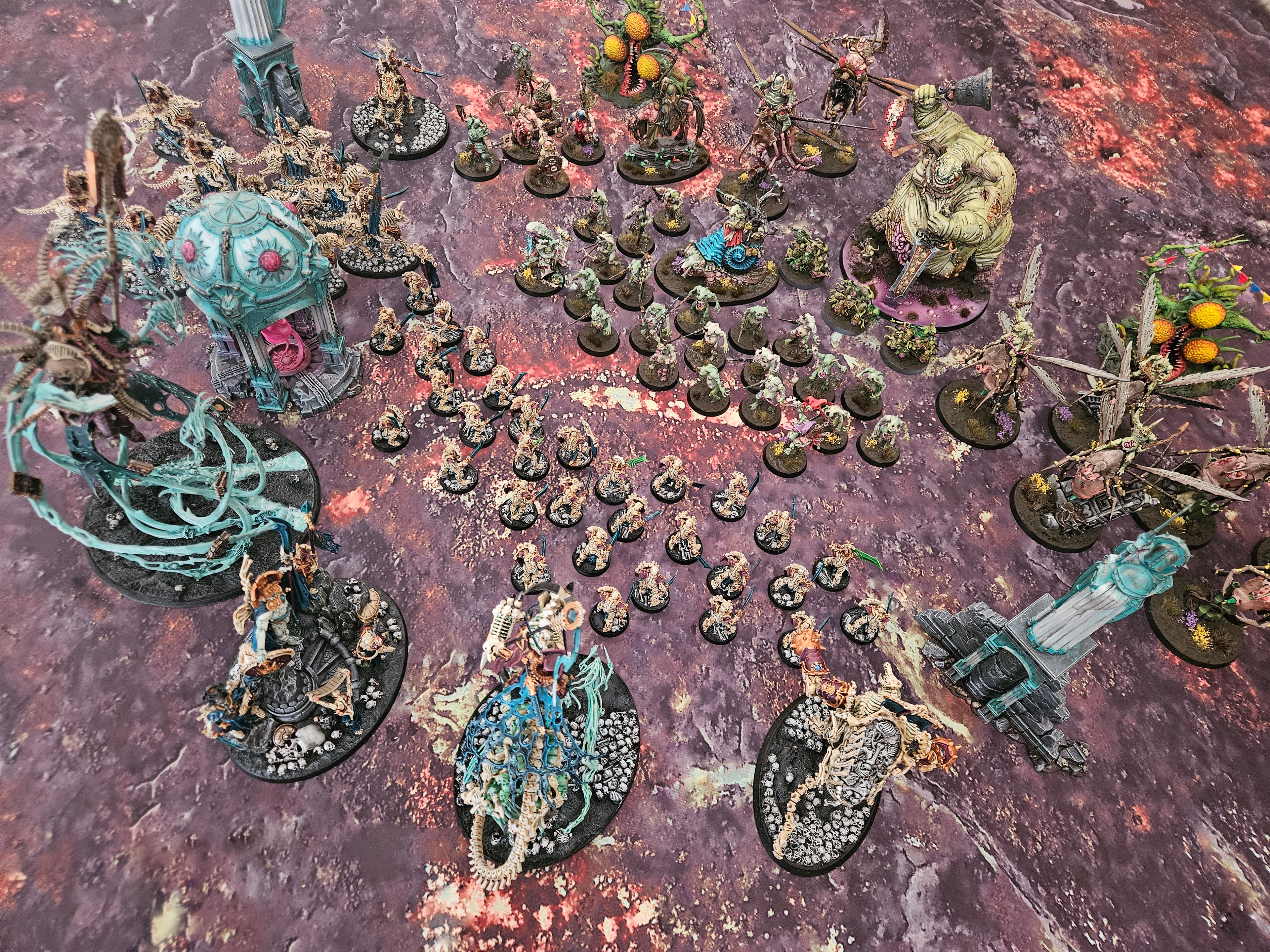 Death World wargaming mat set up as hostile alien planet battlefield with glowing energy fissures for Warhammer 40K