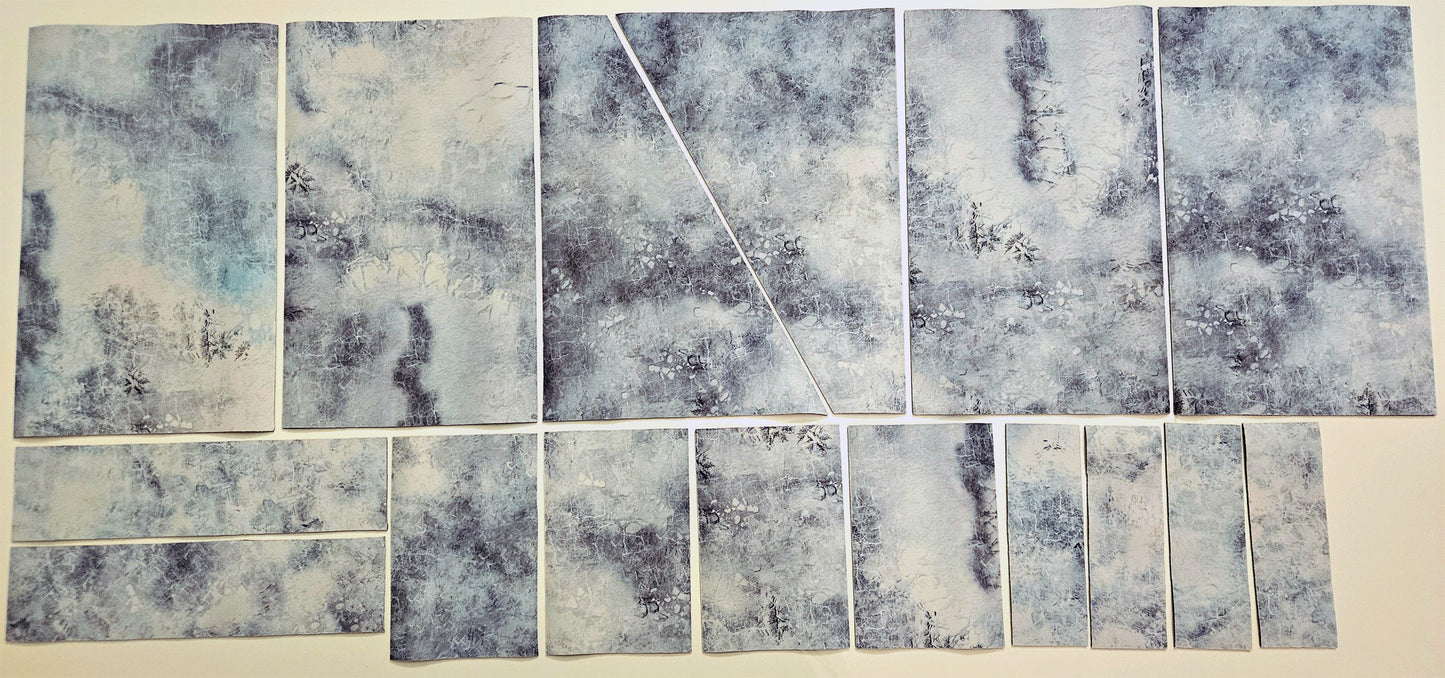 AllOutWar terrain layout templates shown in multiple mat designs including ice tundra — design received will vary